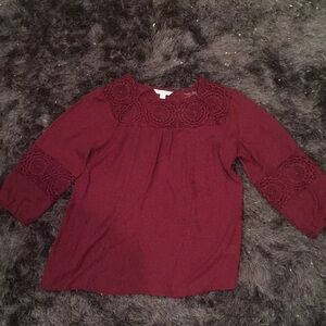 Red blouse with lacy neck line​